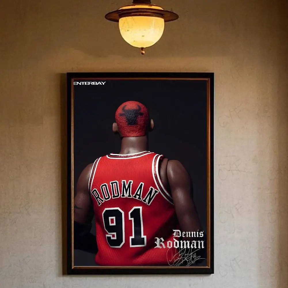 A framed photograph of Dennis Rodman in a red basketball jersey with the number 91, hanging on a wall.