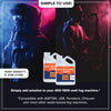 Two bottles of fog machine liquid next to a person using a fog machine