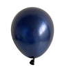 A single, dark blue latex balloon floating against a white background.