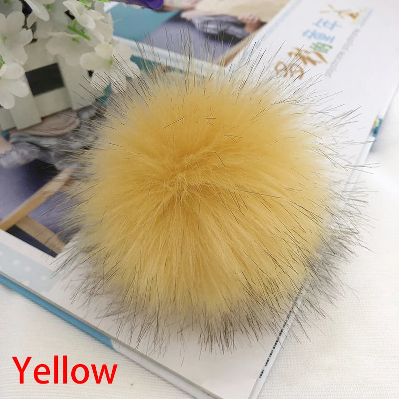 Accessoire boule de cheveux en fausse fourrure jaune et duveteuse