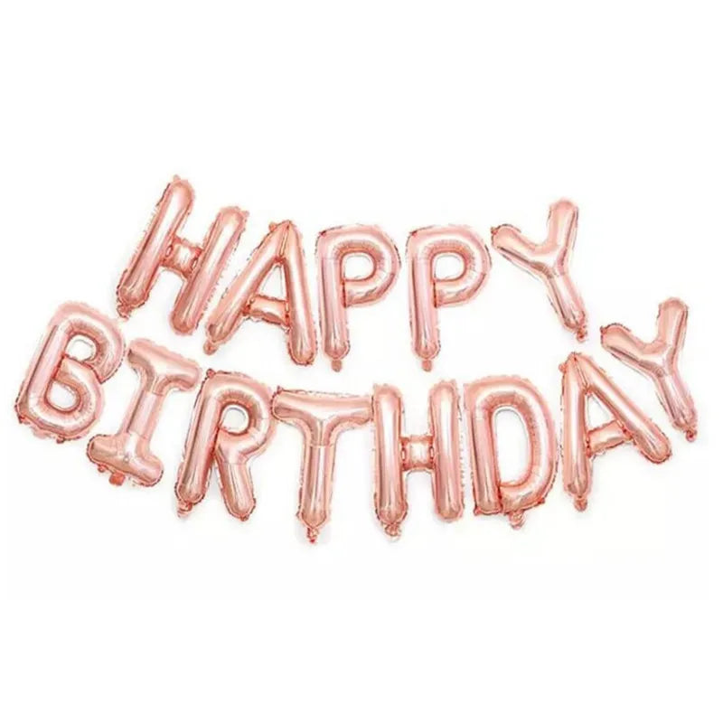 A set of pink letter foil balloons spelling out Happy Birthday for party decoration.