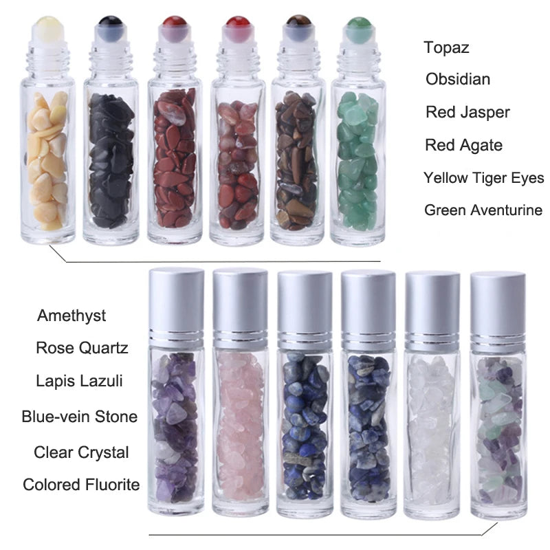 A collection of ten glass bottles filled with various semi-precious stone roller balls including topaz, obsidian, jasper, aga