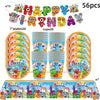 A set of colorful building block birthday party decorations including character figures and a banner.