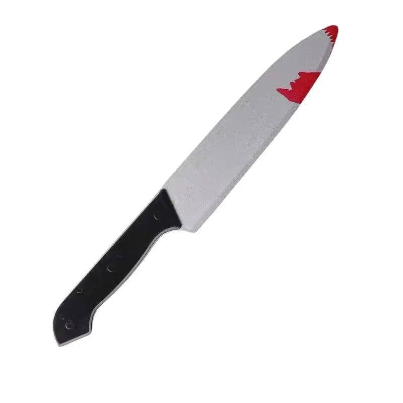 A realistic bloody knife prop with a white blade and red blood splatter on the edge.