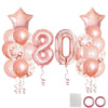 A collection of rose gold foil balloons including star shapes, numbers, and round balloons for birthday party decor.