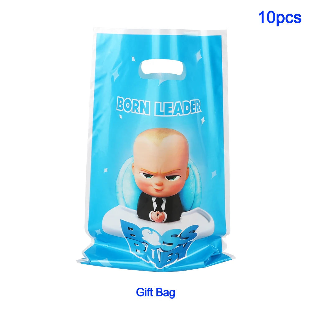 A blue gift bag containing 10 pieces of Born Leader themed party decorations and disposable tableware.