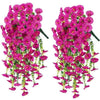 A vibrant pink silk morning glory vine wreath featuring cascading flowers used for weddings and home decor.