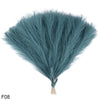 A fluffy, teal-blue artificial reed bouquet with a tapered shape.