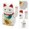 A white electric waving lucky cat figurine with red ears and a gold coin detail.
