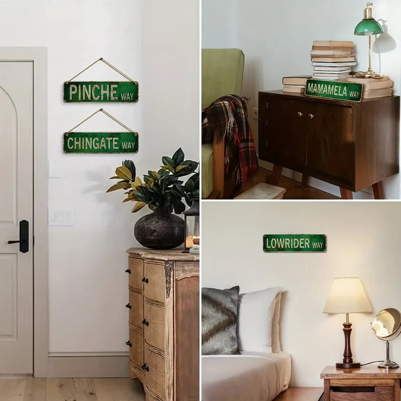A collection of vintage humorous lowrider metal tin signs displayed on a white wall and wooden cabinet.