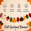 Fall garland banner featuring felt pumpkins, acorns, and maple leaves for autumn decor