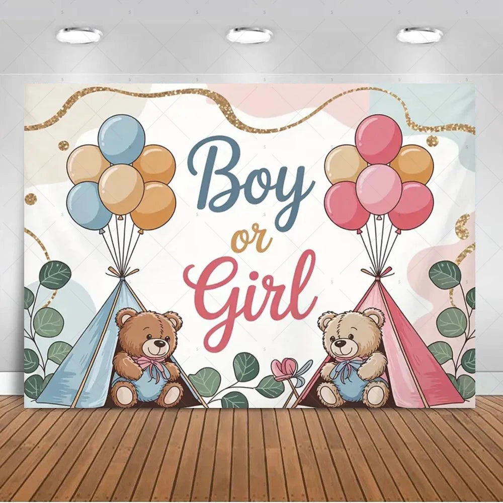A gender reveal backdrop featuring balloons, pink and blue accents, and two teddy bears.