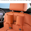 Installed vehicle effect display showing an orange car seat back organizer and headrest hanger.
