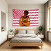 A bed decorated with a patriotic American flag tapestry featuring stars and stripes.