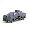 A gray armored vehicle model replica of the Titus Tornado Chaser from a movie, featuring yellow hazard stripes.