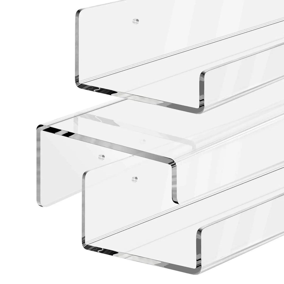 A set of clear acrylic floating display shelves mounted on a wall.