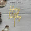 Gold acrylic birthday cake topper with the words Happy Birthday on a stick