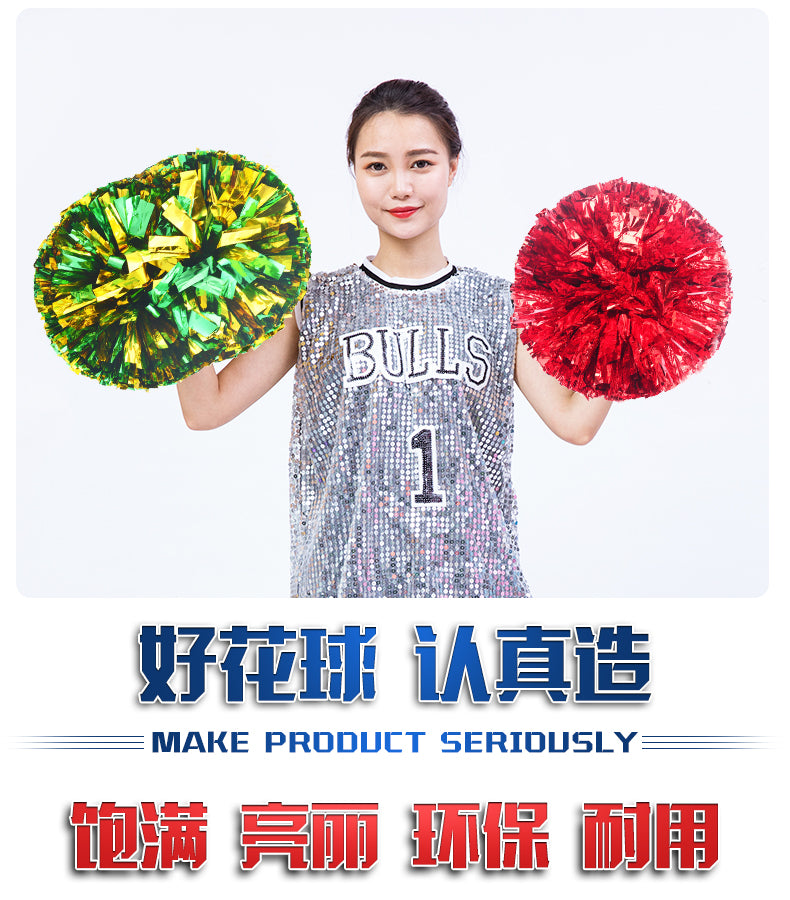 A woman holds a vibrant green pom pom cheerleading accessory.
