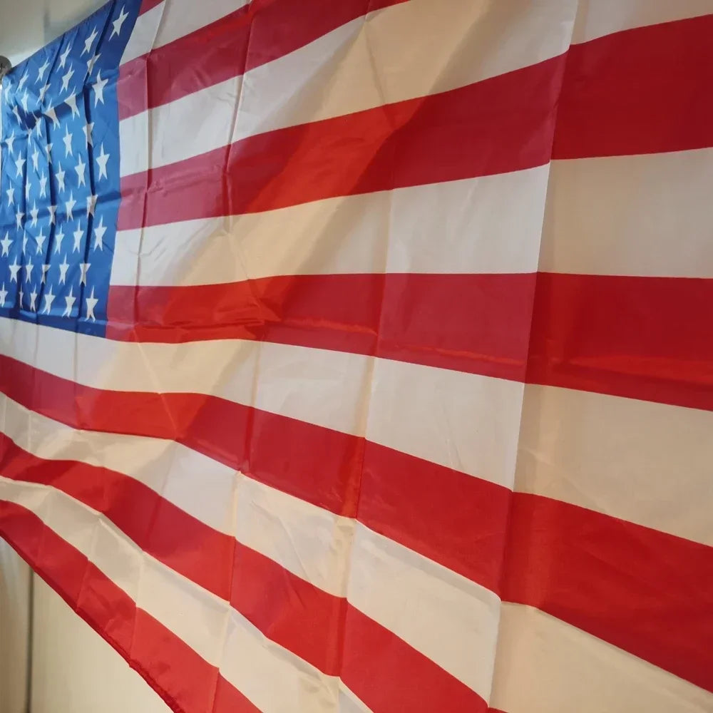 A close-up view of the American flag draped and waving.