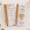 Two personalized engraved bamboo pens and thank you cards for a wedding or celebration.