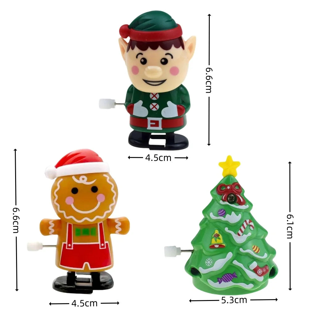 A set of two wind-up figurines: a green elf and a red Christmas tree.