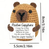 Hand-woven capybara plush pendant with an encouraging card featuring a positive message