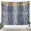 Leopard print tapestry wall hanging featuring a wild animal pattern with string lights.