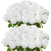 A bouquet of white artificial roses with green leaves.