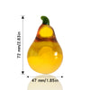 A yellow crystal glass pear figurine with a green stem, shown against a white background.