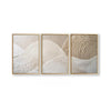 A set of three framed abstract canvas prints featuring beige and white textured mountain shapes.