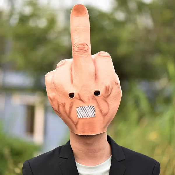 A hand wearing a latex finger mask shaped like a middle finger, used for Halloween pranks.
