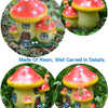 A detailed resin mushroom house garden statue featuring a bright orange cap and yellow body with carved details.