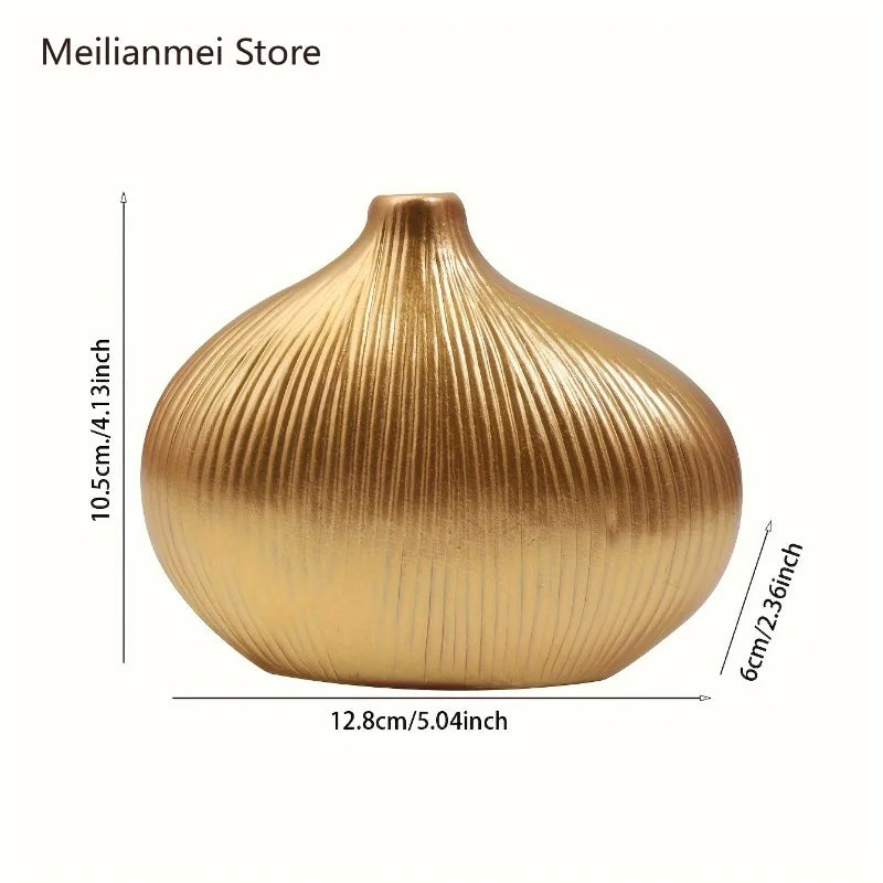 A golden, ribbed resin vase with a rounded shape shown from the side.