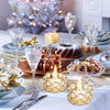 A crystal tealight candle holder with a metal base is displayed on a table setting surrounded by festive decor.