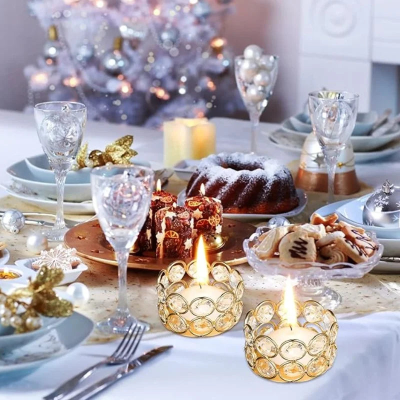 A crystal tealight candle holder with a metal base is displayed on a table setting surrounded by festive decor.