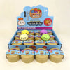 A box of squishy dumplings stress relief toys featuring various colors and a mystery theme.