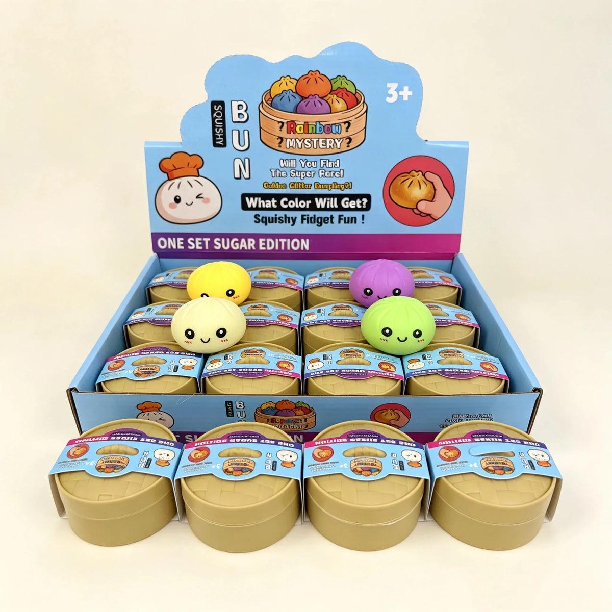 A box of squishy dumplings stress relief toys featuring various colors and a mystery theme.