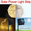 A close-up view of a yellow solar power light strip string wrapped around a stake, demonstrating high efficiency solar power.