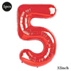 A red foil balloon shaped like the number five, measuring 32 inches.