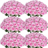 A bouquet of pink artificial silk roses arranged for table decor.