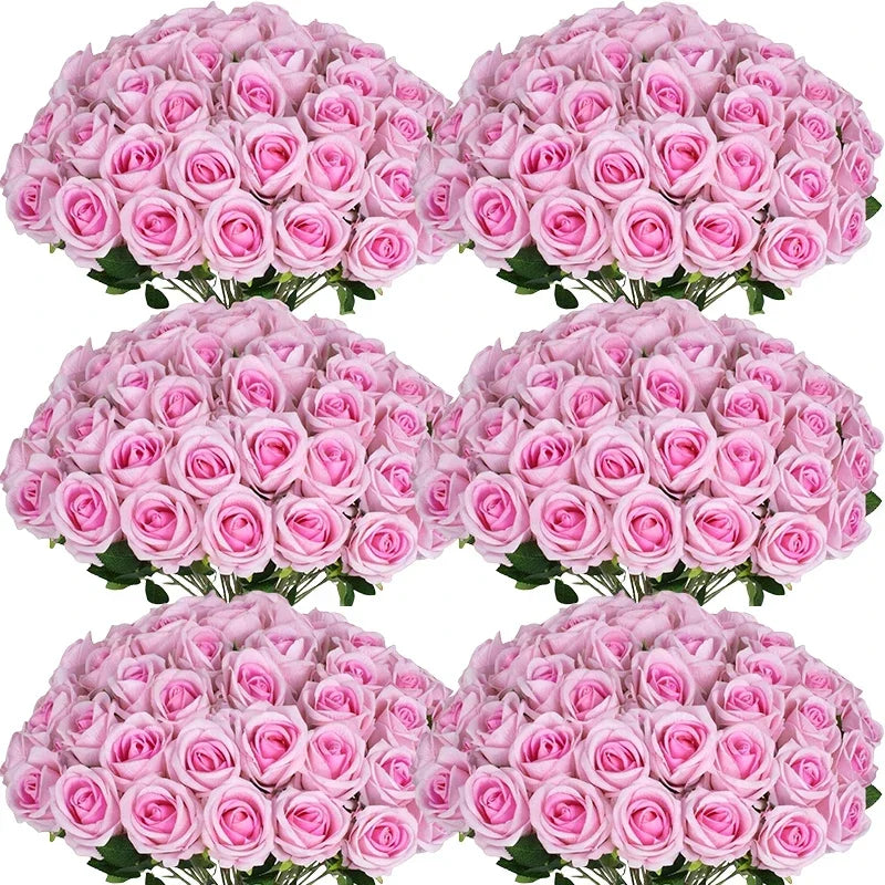 A bouquet of pink artificial silk roses arranged for table decor.