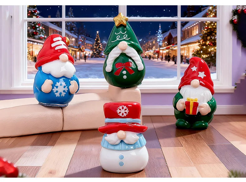 A set of festive resin Christmas dwarf figurines featuring a red hat and white beard in various colors