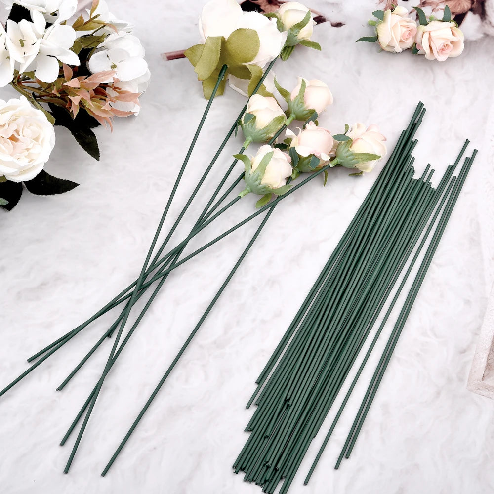 A bundle of artificial green flower stems used for DIY floral decor, lying on a white surface.