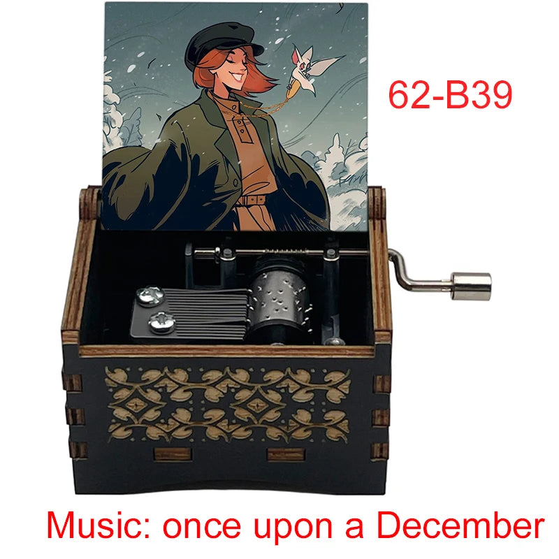 A hand-cranked wooden music box labeled 62-B39 featuring an illustration of a woman and decorative wood carving.