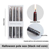 Set of four Halloween pole wax taper candles with black and red dripping blood effect in an elegant gift box