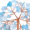 A branch of crystal money tree decor featuring light blue translucent stones on a natural brown wire stem.