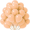 A bunch of pastel peach and beige latex balloons tied together for party décor