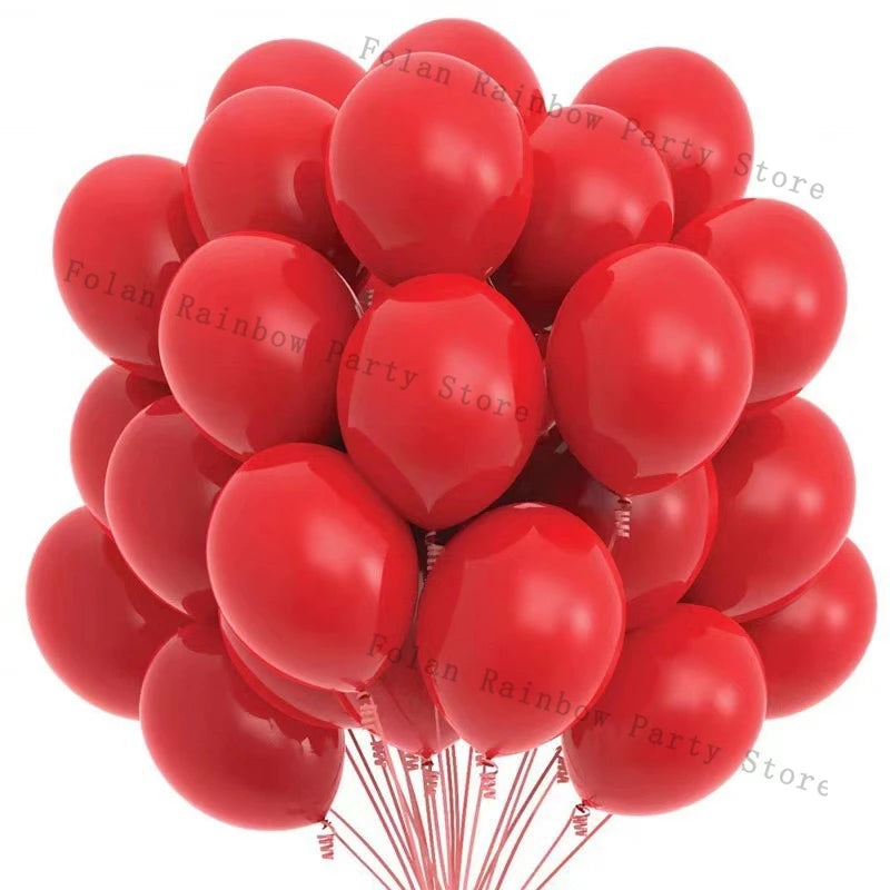 A cluster of matte red latex balloons forming a decorative garland.
