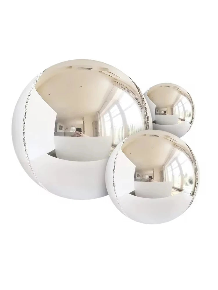 A collection of 14 metallic chrome balloons in various sizes and shapes, displayed against a white background.