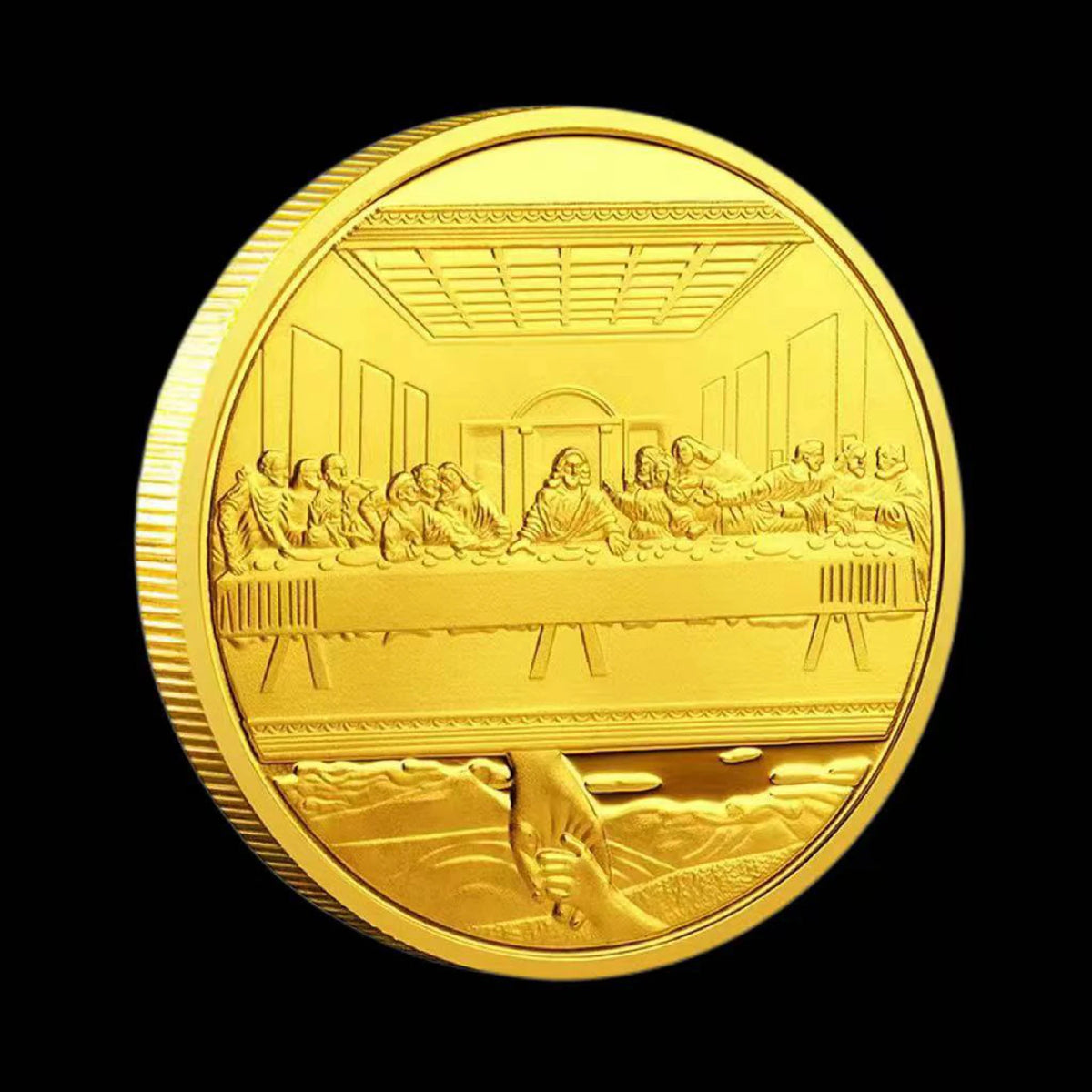 A round gold commemorative metal coin depicting a scene from the Last Supper.